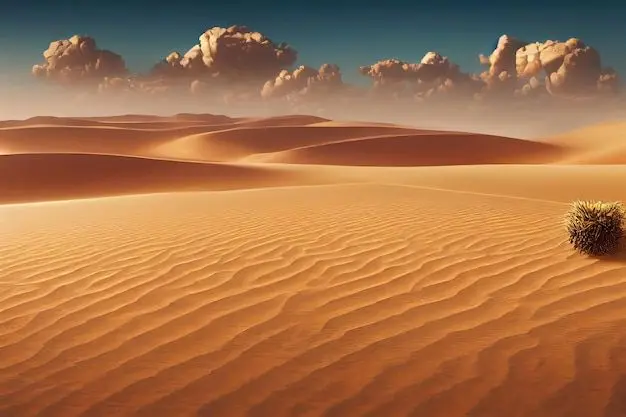 منظره بیابانی با شنهای طلایی و آسمان آبی