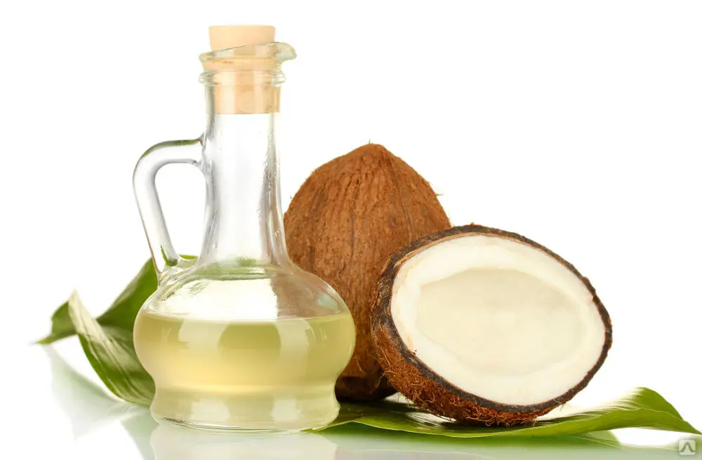 روغن کاکو در ظرف شیشه‌ای با کاکوهای تازه